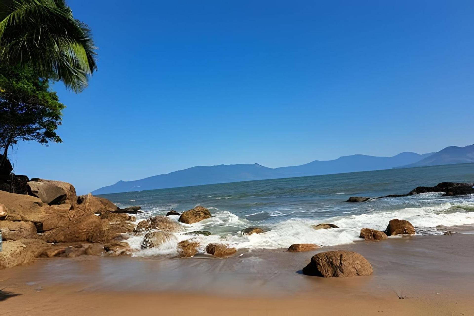 Chale Proximo A Praia Martim De Sa 卡拉瓜塔图巴 外观 照片